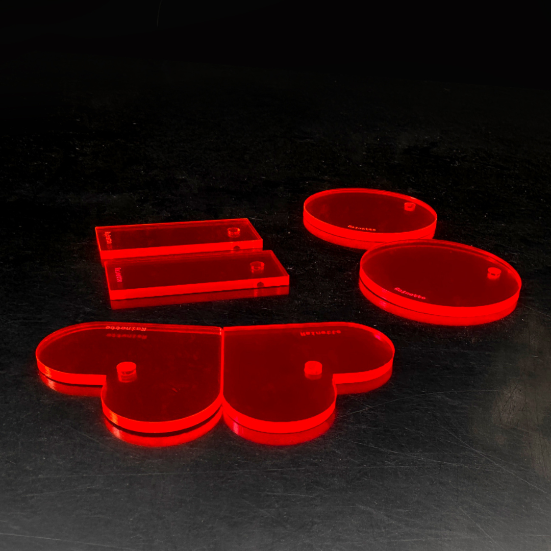 Charms en Plexi Fluo